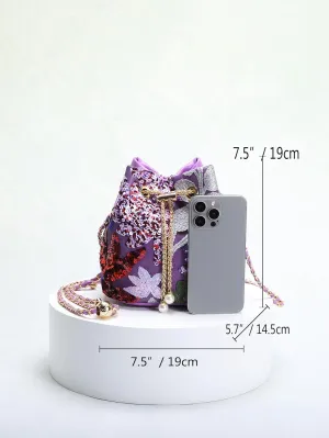 New Chinese style bucket bag Women's new heavy craft mesh embroidery flower sequin chain crossbody bag.